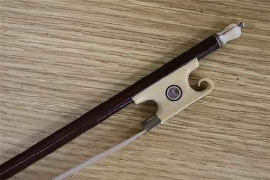 A silver mounted violin bow, an ivory mounted violin bow and a late 19th century German violin, cased